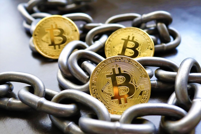 bitcoin coins and a chain