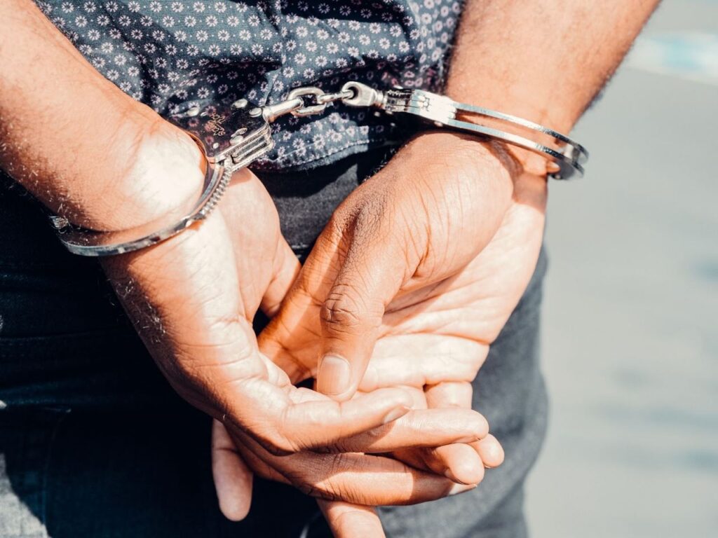 A person in handcuffs