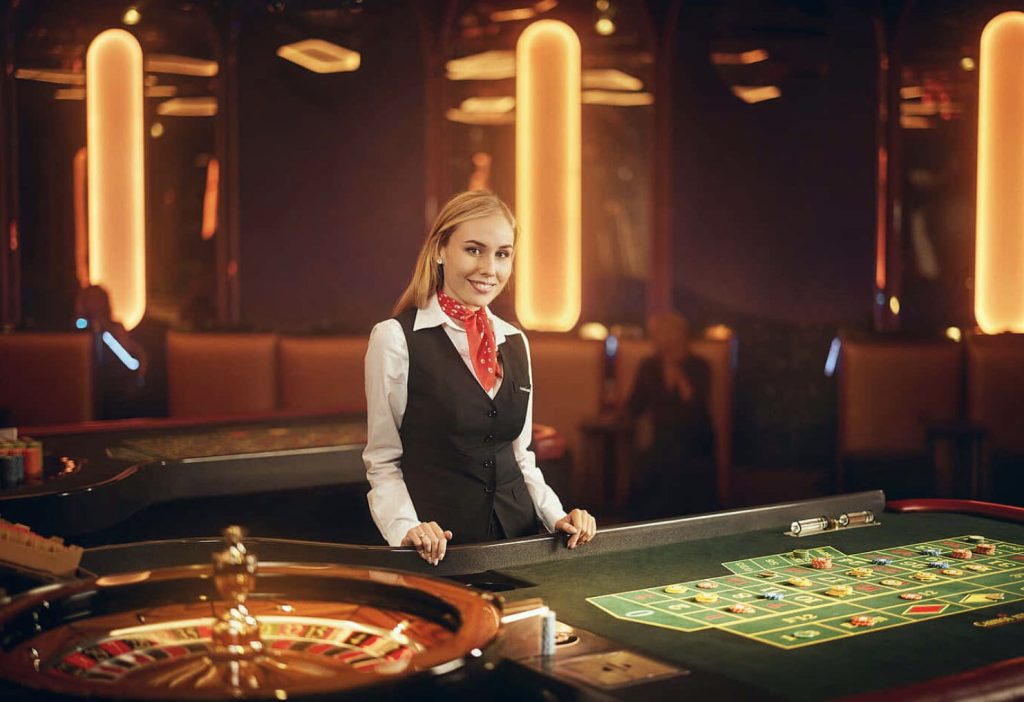 A Roulette dealer smiling